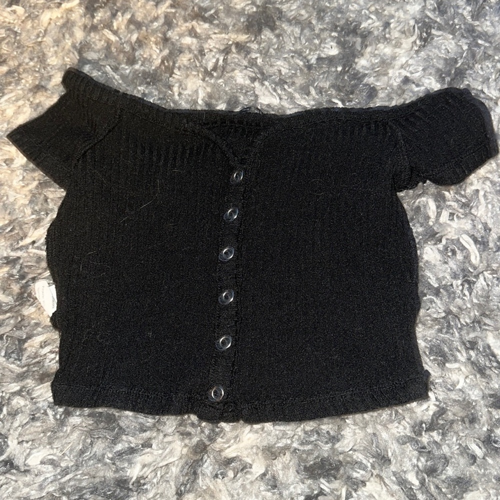 Black over the shoulder cropped top